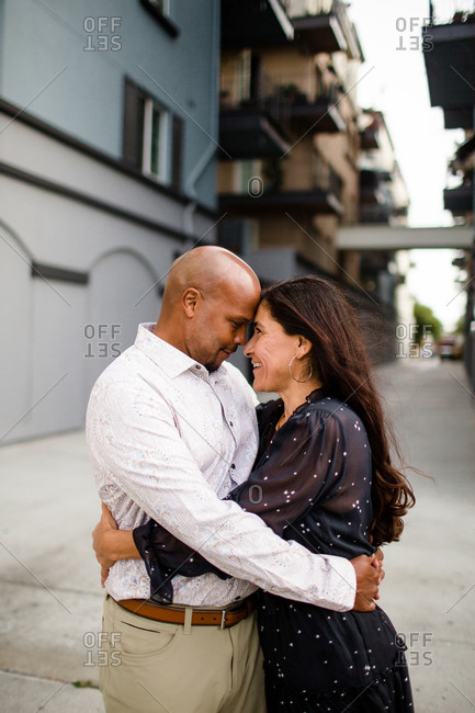 Late Forties Couple Embracing in Alley in San Diego