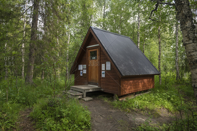 Sweden, Norrbotten County, Njunjes - July 23, 2019: Small shelter in forest at southern trailhead of Padjelantaleden trail, Lapland, Sweden