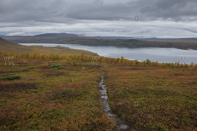 Looking towards lake Riebnes from above the treeline along Kungsleden Trail, Lapland, Sweden