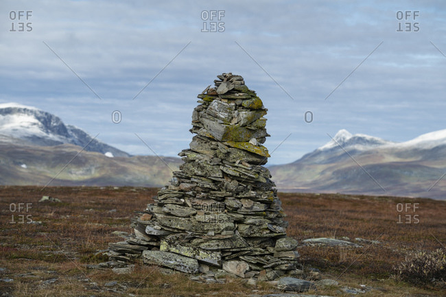 Rock cairn marking summit of Stuorajabba (926m) along Kungsleden Trail north of Ammarnas, Lapland, Sweden