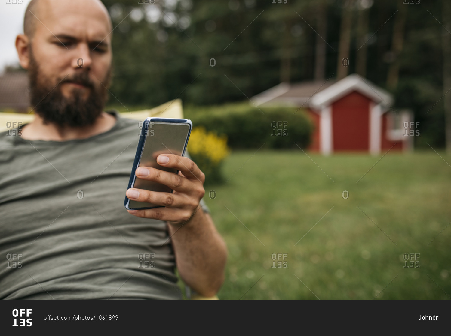 Man using cell phone from the Offset collection