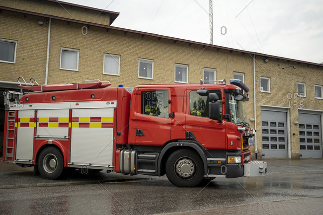 Fire engine in front of fire station