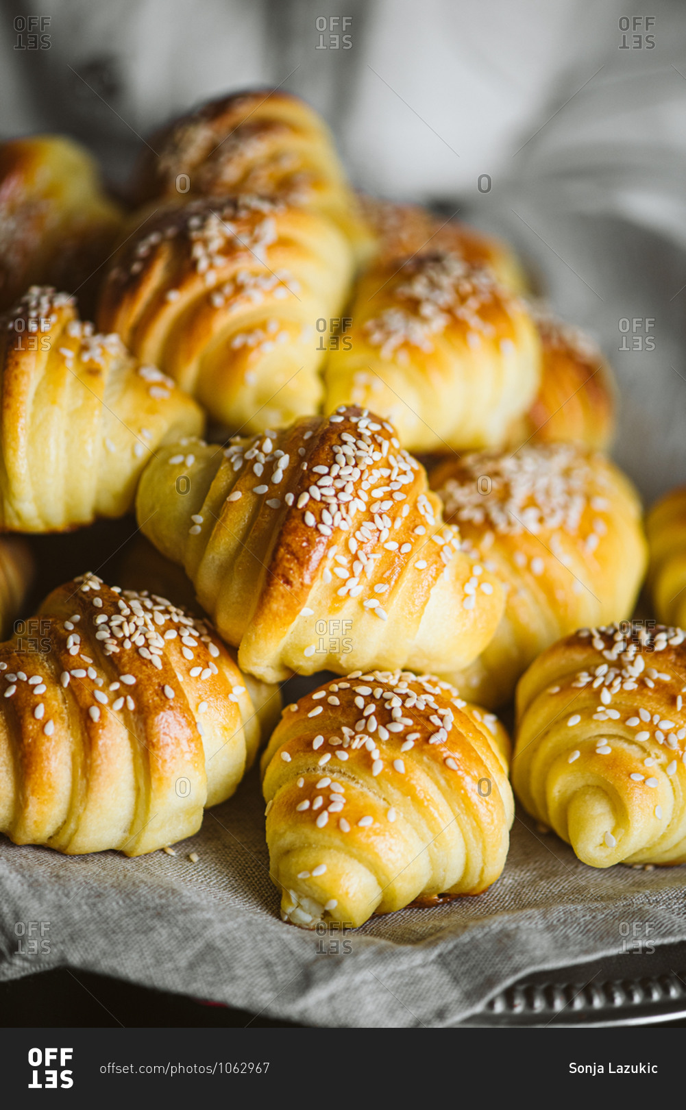 Golden croissants with sesame seeds