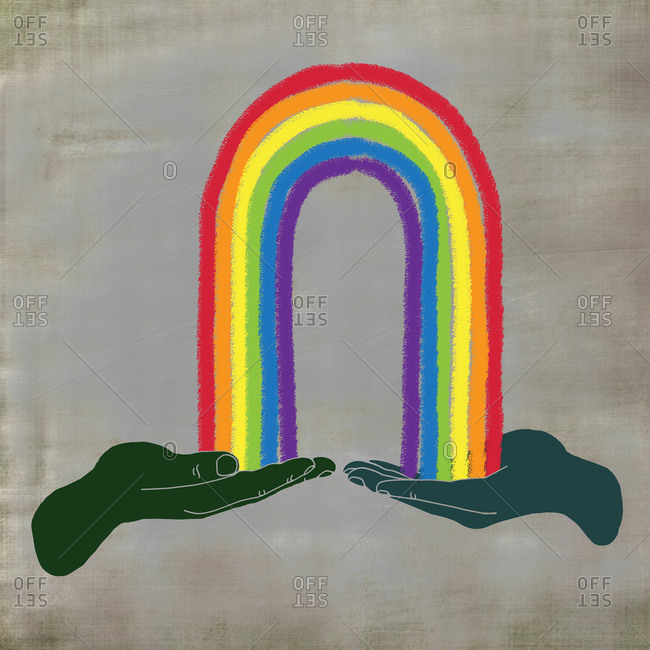 Hands holding a rainbow on a neutral background