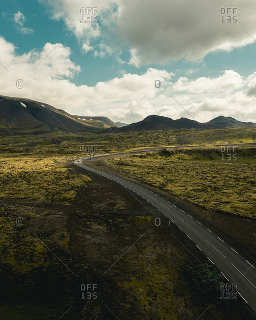 Aerial view of road in volcanic Icelandic landscape, outside the capital, Iceland.