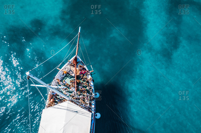 August 9, 2019 - Tisno, Croatia: Aerial view of a boat in the turquoise waters