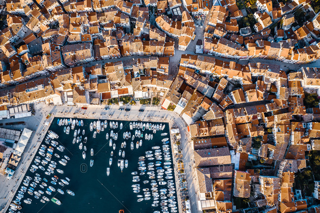 Aerial view of a jetty surrounded by houses in Rovinj, Croatia