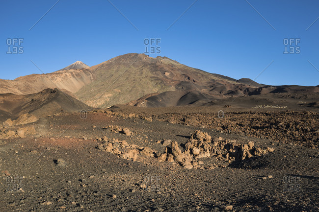 Volcanic landscape with a view of the volcanoes Pico del Teide (3718 m) and Pico Viejo (3135 m), El Teide National Park, UNESCO World Heritage, Tenerife, Canary Islands, Spain