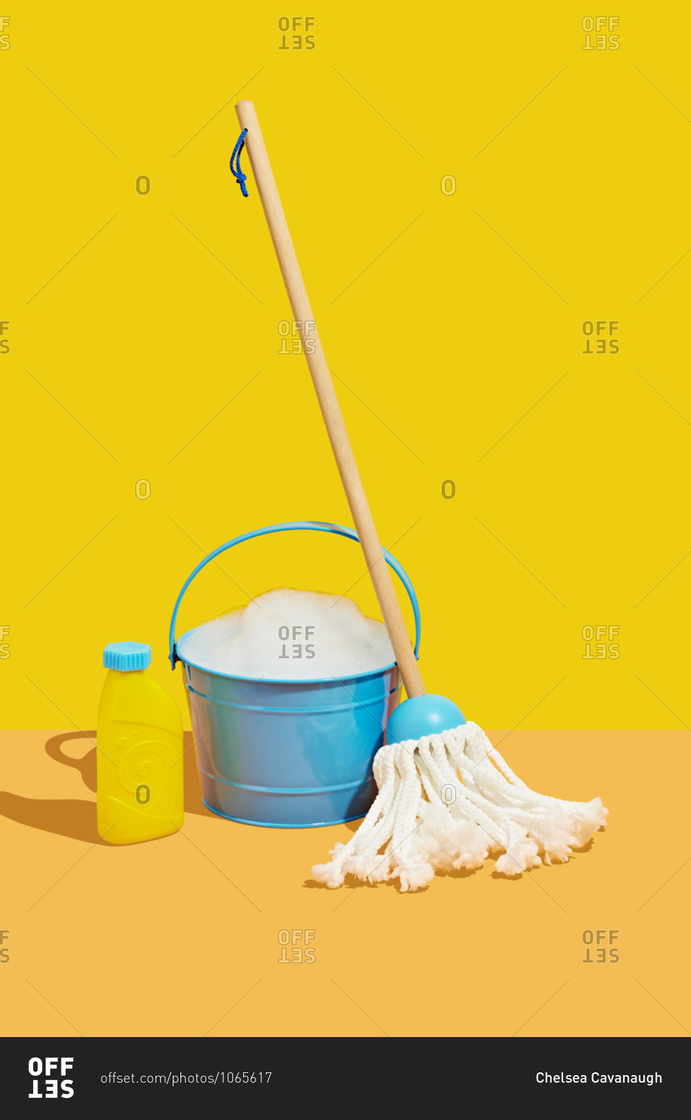 Toy Mop and Bucket with Soap on Yellow