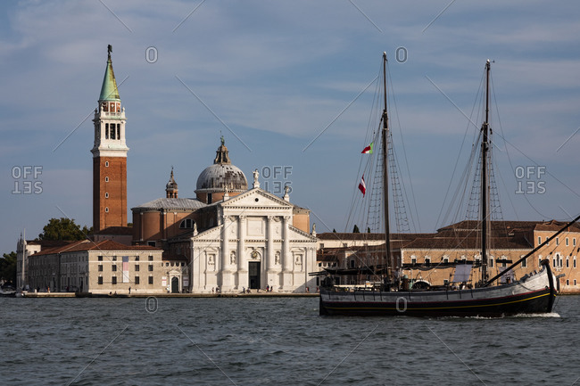 September 19, 2020: Italy- Veneto- Venice- Sailing ship passing San Giorgio Maggiore church