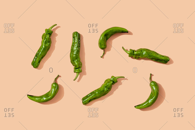 Studio shot of green chili peppers