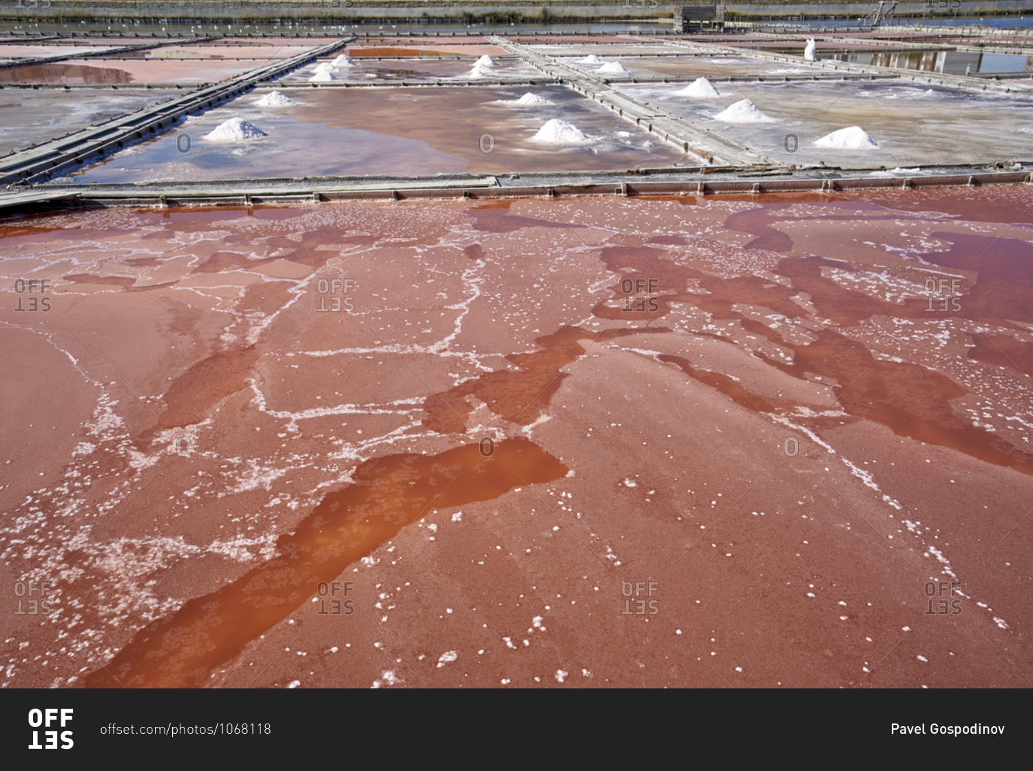 Pink waters of artificial salt lakes and ponds at Pomorie Lake used for extracting sea salt to make cosmetics, Pomorie, Bulgaria