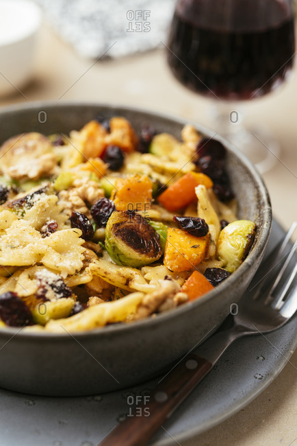 Brussels sprouts and winter squash on pasta with cranberries