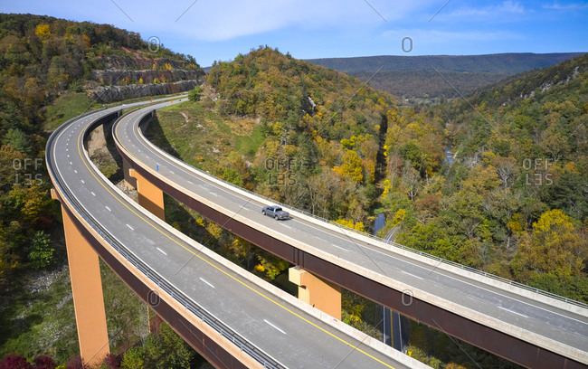 USA- West Virginia- Aerial view of U.S. Route 48 bridge stretching over Lost River in Appalachian Mountains