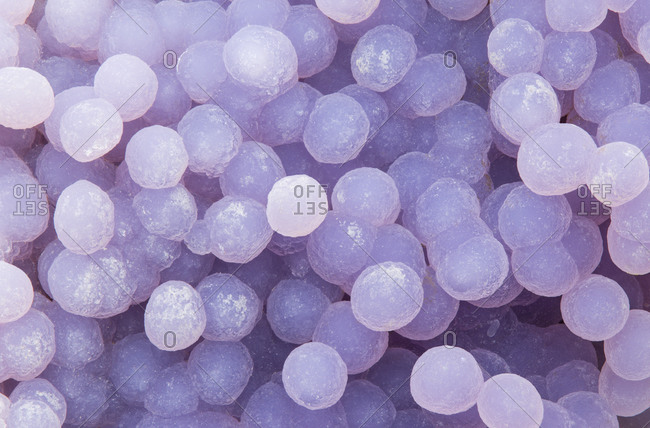 Macrophotograph of the repetitive structure of a grape agate from Indonesia