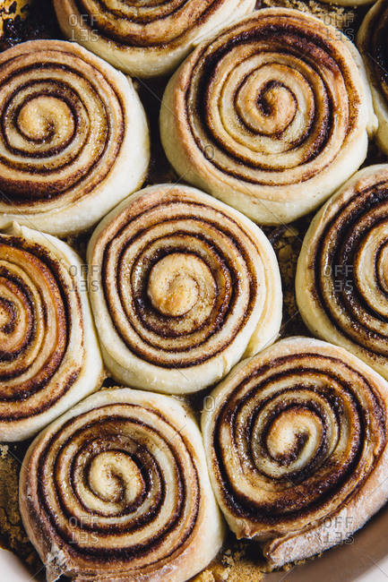 Extreme close up of cinnamon rolls fresh out of the oven