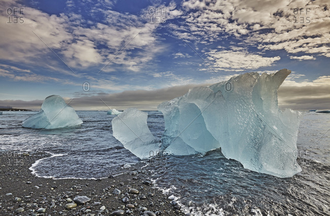 Melting glacial ice, carved from the Vatnajokull icecap, on the beach at Jokulsarlon, on the south coast of Iceland, Polar Regions