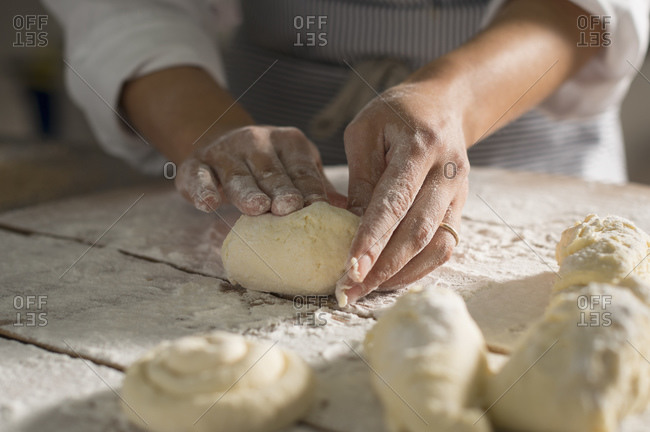 Baker making assortment of gluten-free bread