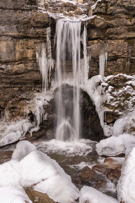 Waterfall with ice in winter in the so-called kuhflucht in the bavarian alps