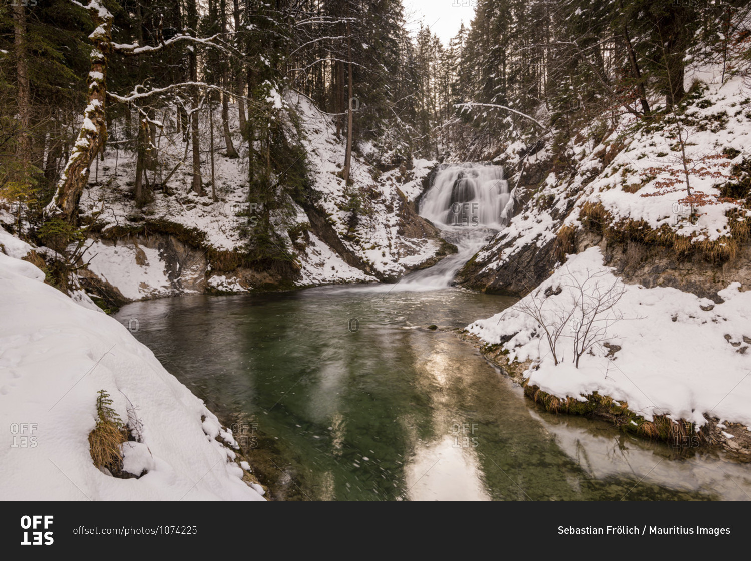 Waterfall of the obernach canal between wallgau and the walchensee in ...