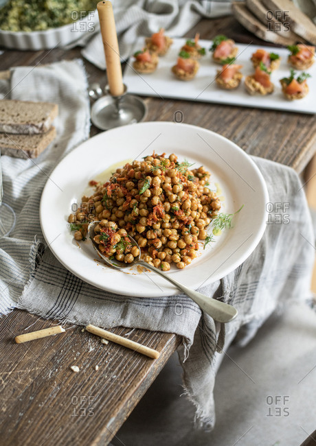 Top view of chickpea salad on a rustic table