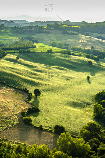 July 2, 2018: The countryside of the Val d'Orcia seen from a hot air balloon, Tuscany, Italy