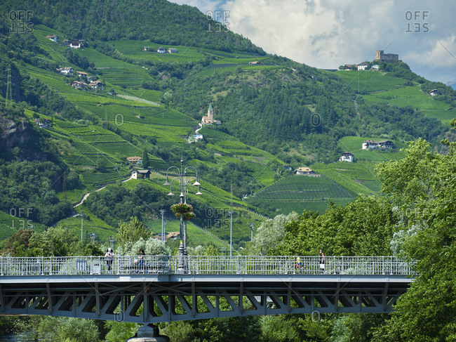 Talvera bridge and mountains towards San Genesio in the background