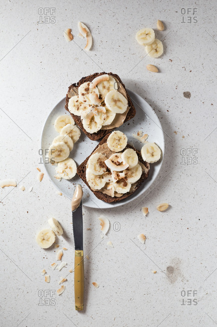 Chocolate bread with almond cream- banana and coconut