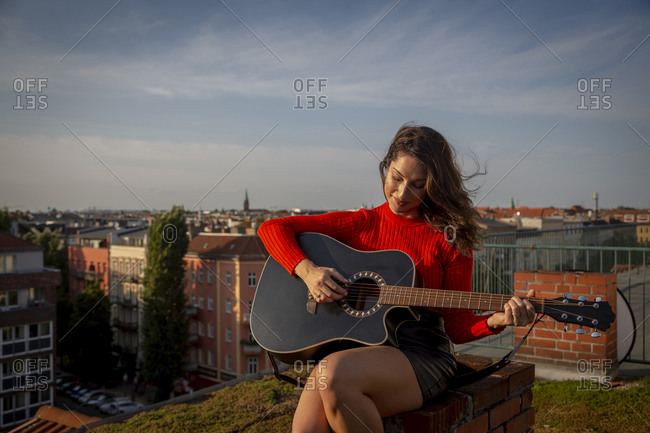 beautiful young girl posing with guitar Stock Photo | Adobe Stock