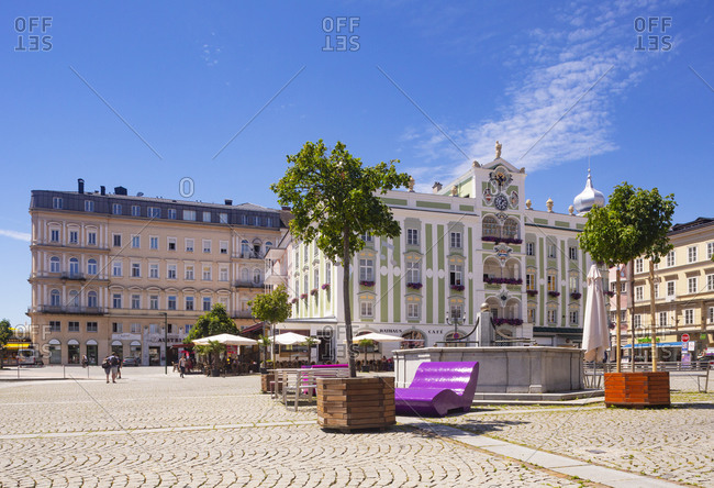 July 8, 2020: Town hall with ceramic carillon at city square against blue sky- Gmunden- Salzkammergut- Upper Austria- Austria