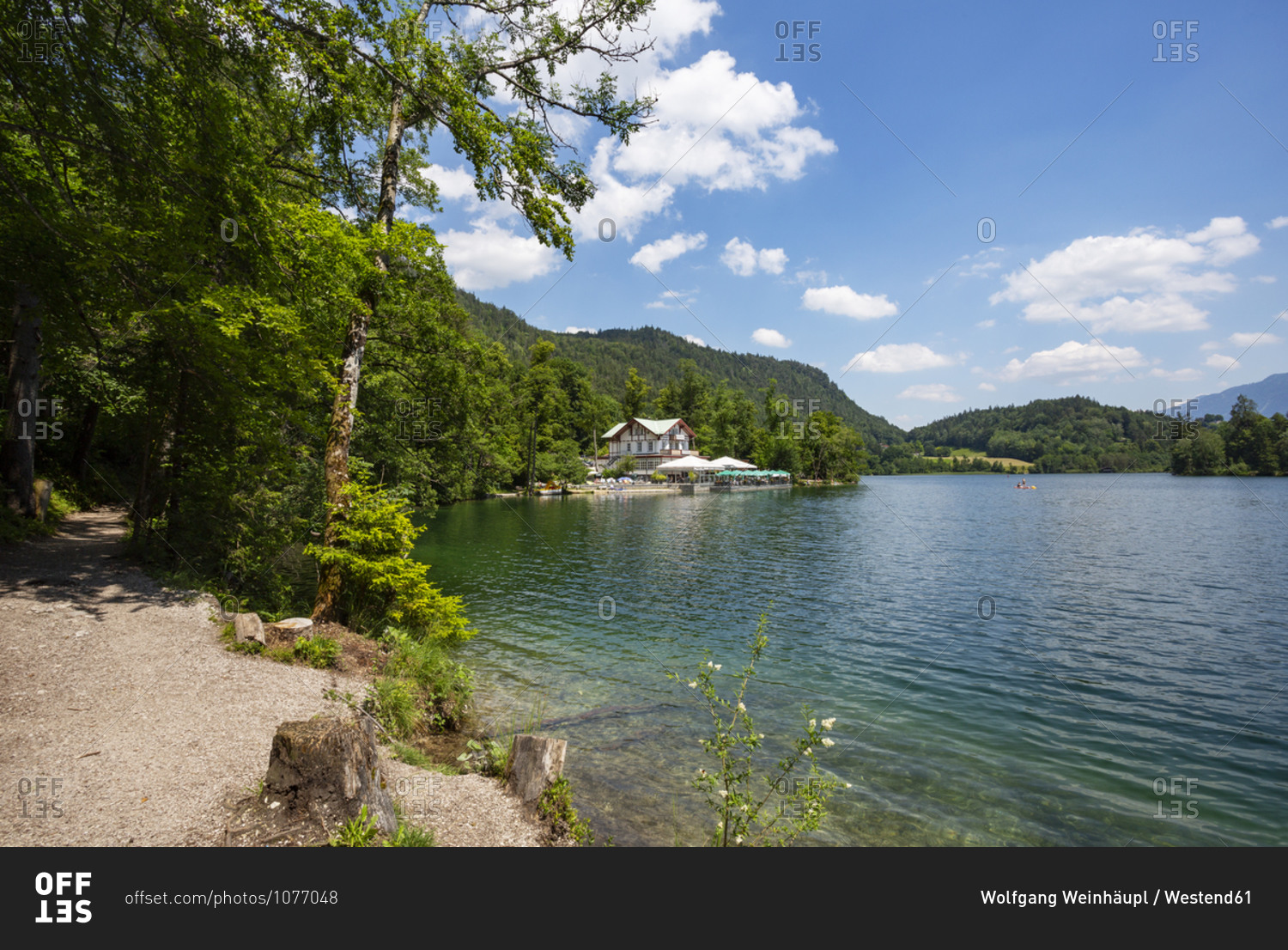 Germany- Bavaria- Bad Reichenhall- Shore of Thumsee lake in summer with restaurant in background