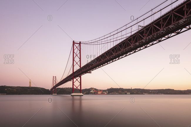 Portugal- Lisbon District- Lisbon- 25 de Abril Bridge at dusk