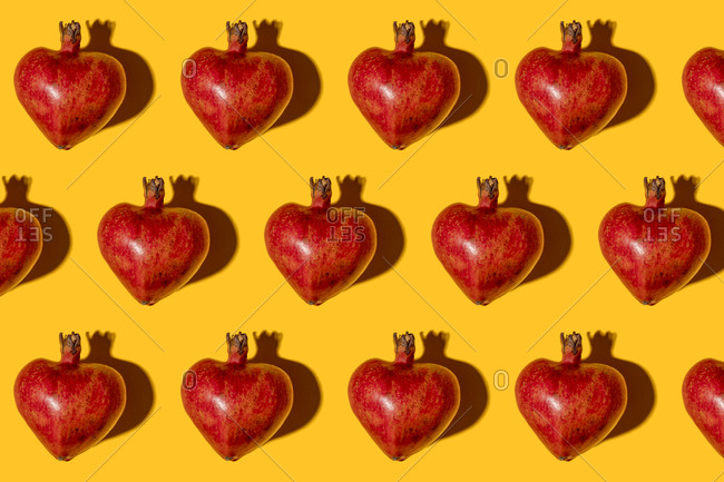 Pattern of heart shaped pomegranates