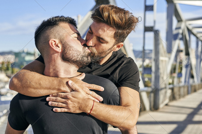 Man kissing another man