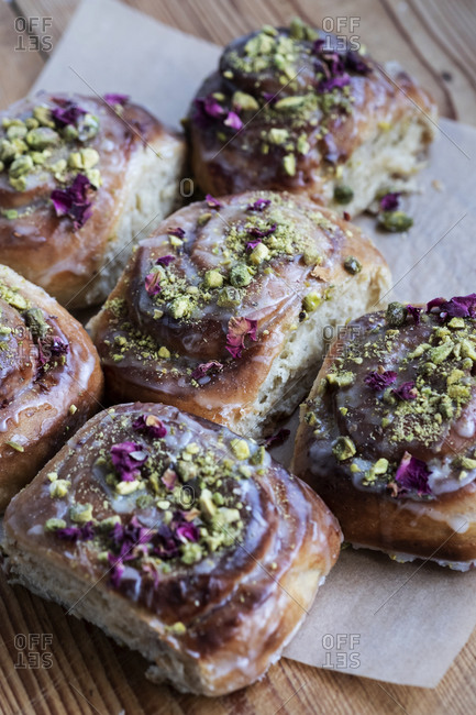 High angle close up of freshly baked Danish Pastries with Pistachio Nuts.