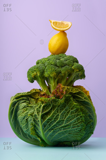 Still life with savoy cabbage, broccoli and lemon
