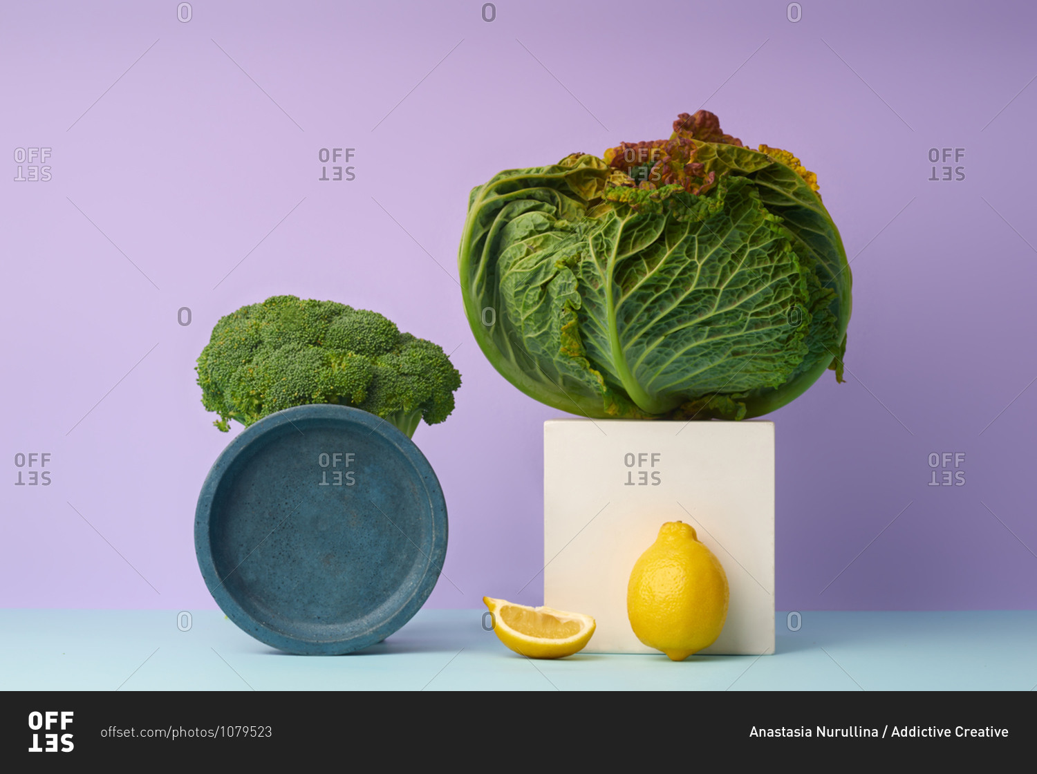 Still life with savoy cabbage, broccoli and lemon