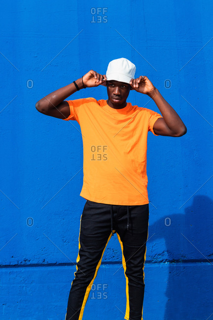 yellow shirt with blue pants