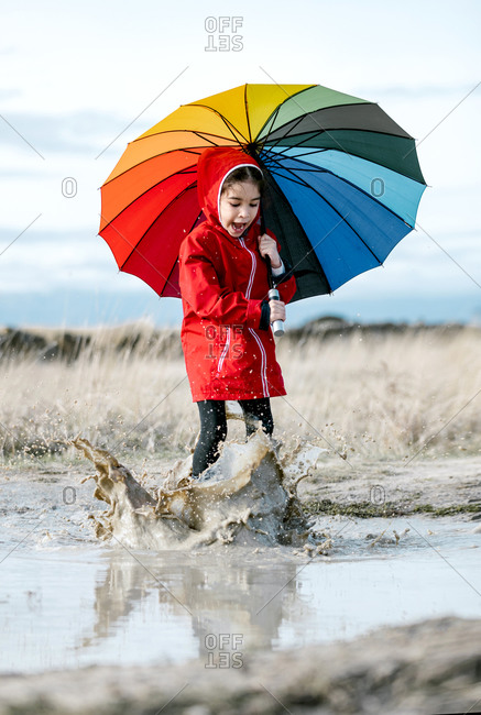 little girl umbrella and boots