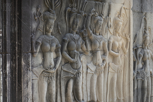 Bas-relief of female figures on the exterior walls of Angkor Wat