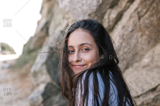 Portrait of young teenage girl in a nature environment