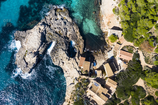 Spain- Mallorca- Santanyi- Helicopter view of coastal village in summer