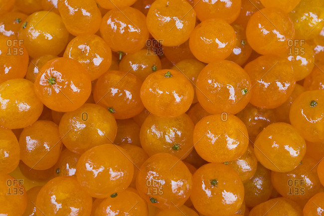Heap of candied clementines ready to eat