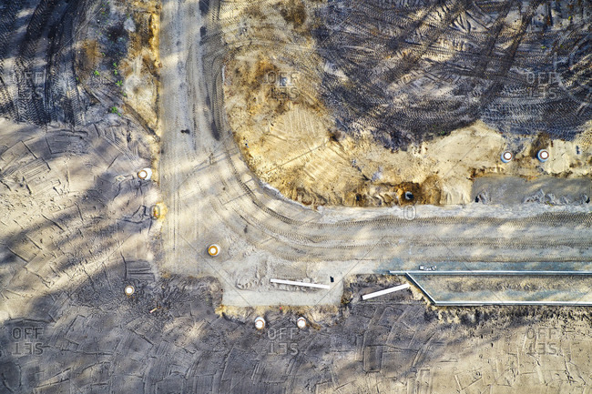 Structures, traces, earth colors, infrastructure, development of a building area, road layout, from above, abstract shapes