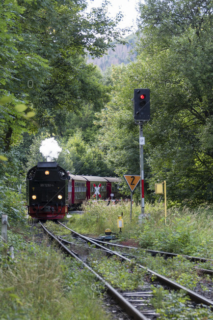 July 12, 2020: Germany, Saxony-Anhalt, Wernigerode, the Brockenbahn reaches the Wernigerode-Hasserode station.