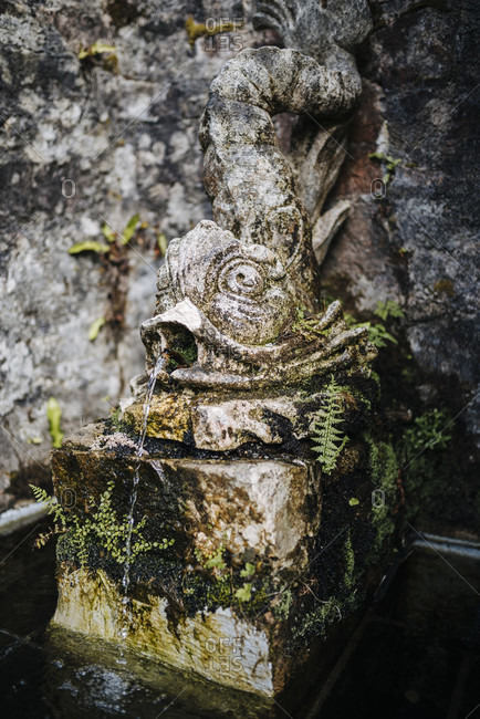 Fish sculpture, fountain in the gardens of Glenveagh Castle, Glenveagh National Park, Ireland