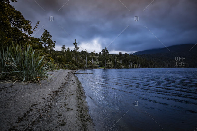 Sunset on the shores of Lake Brunner, South Island New Zealand