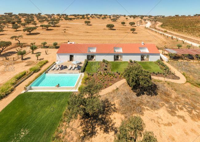 Aerial view of villa with pool, Portugal.
