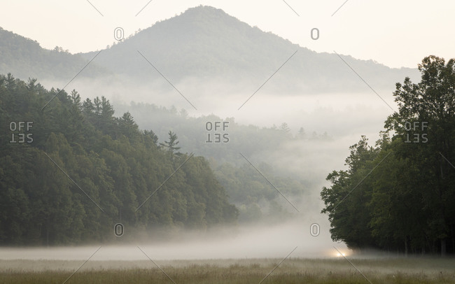 Fog covered field and hills in Cataloochee Valley in the Great Smoky Mountains of North Carolina