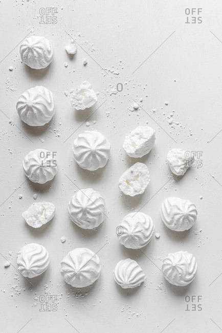 White meringues on white background